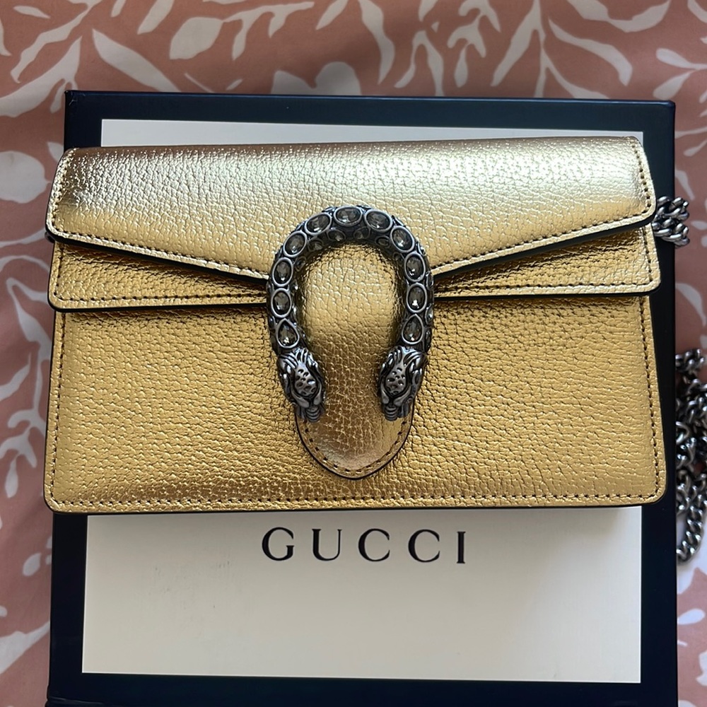Authentic Gucci Mini gold crossbody bag